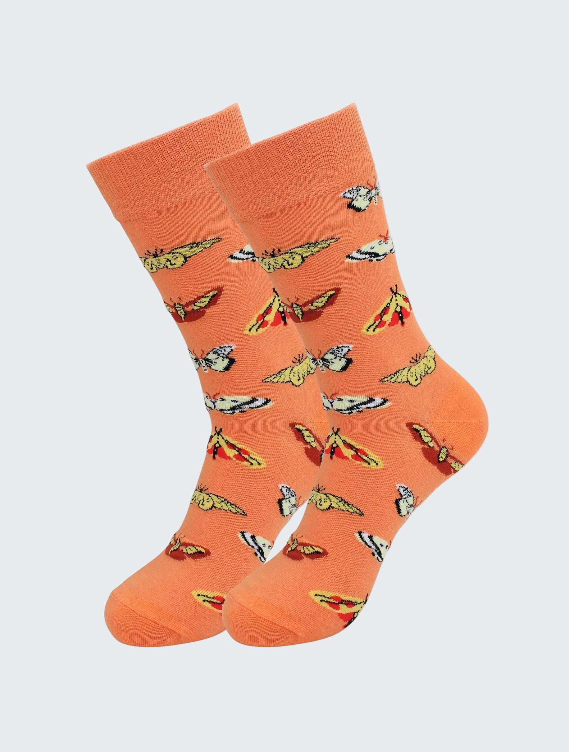 Orange socks with butterfly pattern on a white background