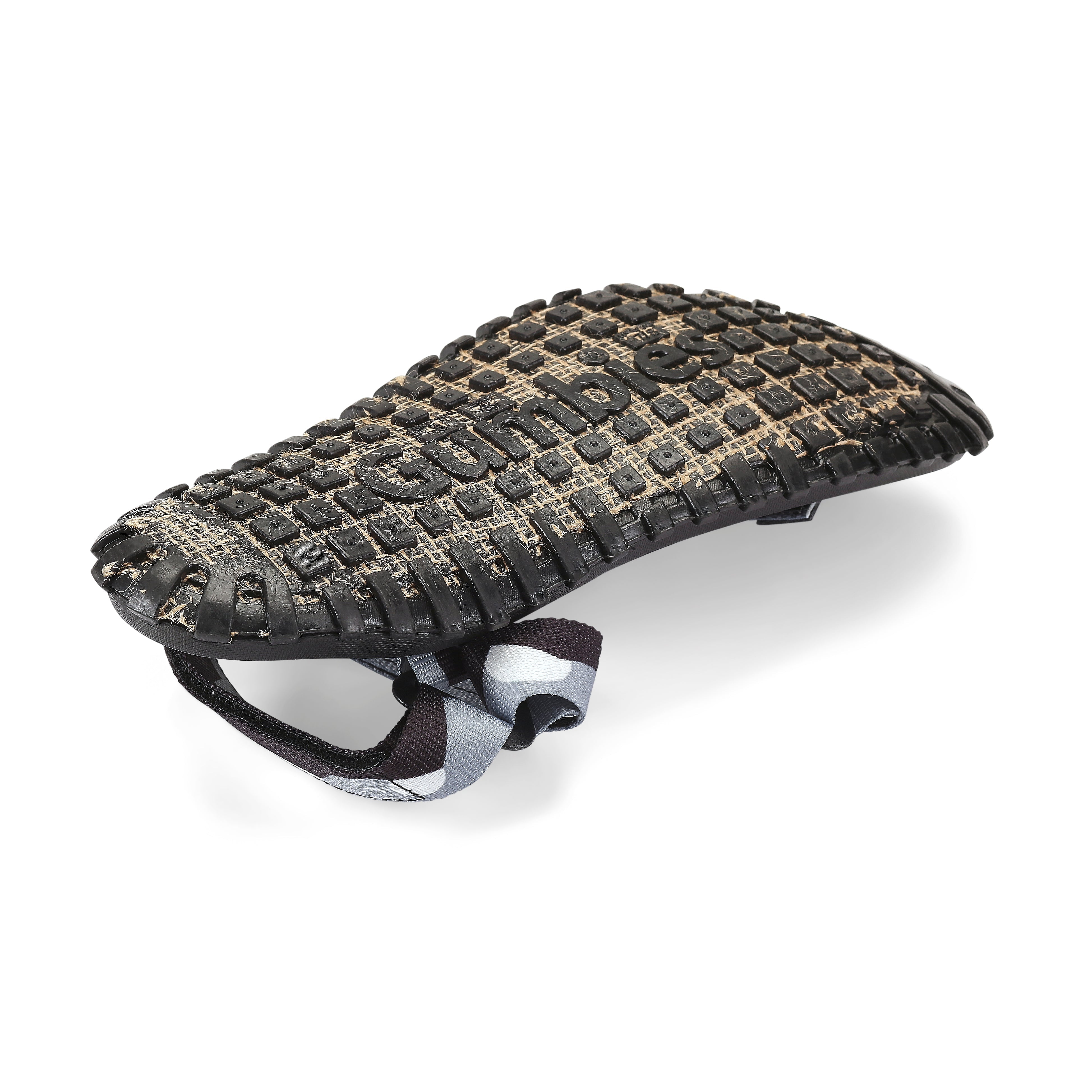 Black and gray bike seat with textured surface on a white background