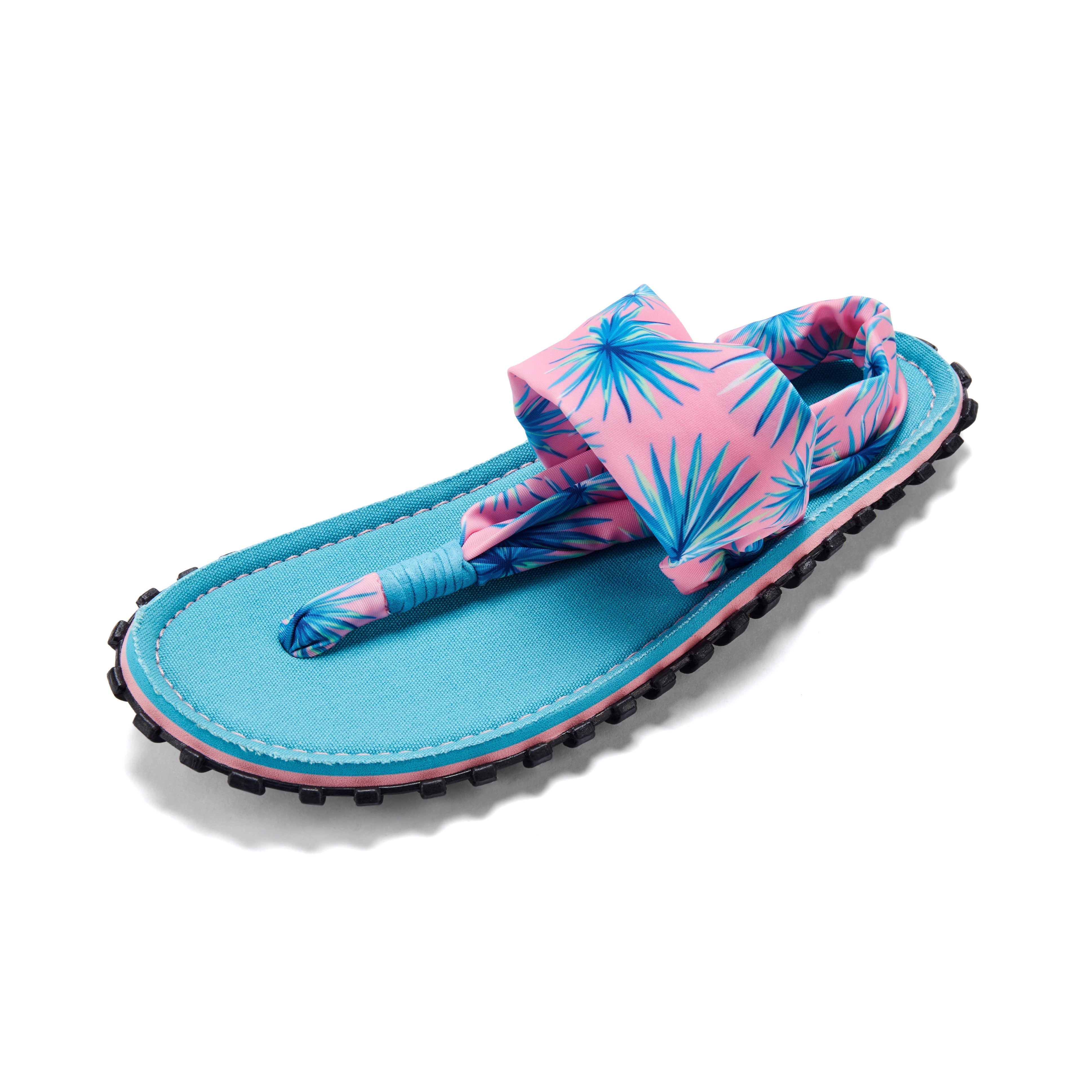 Blue sandal with pink floral straps on a white background