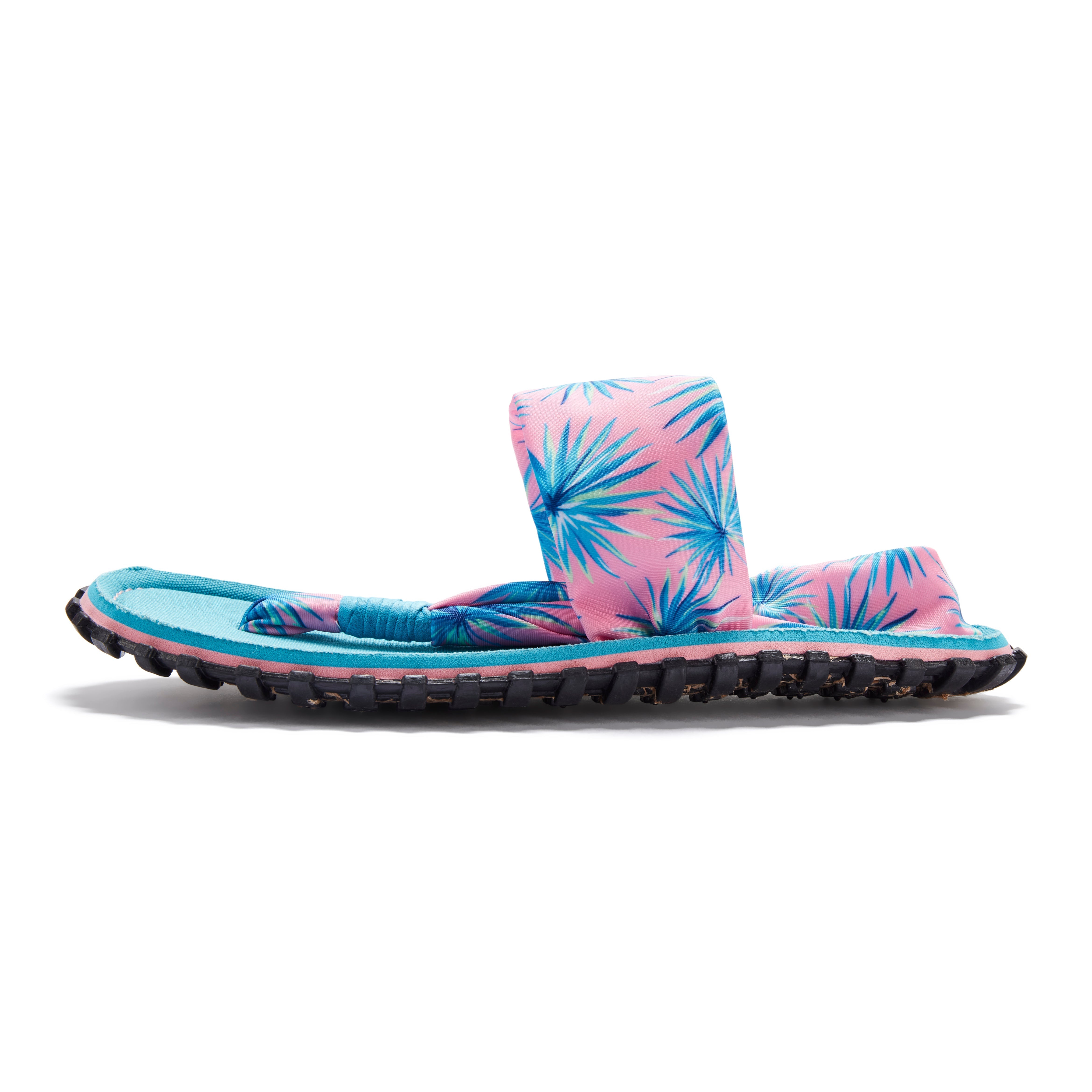 Pink and blue flip-flop with palm leaf pattern on a white background