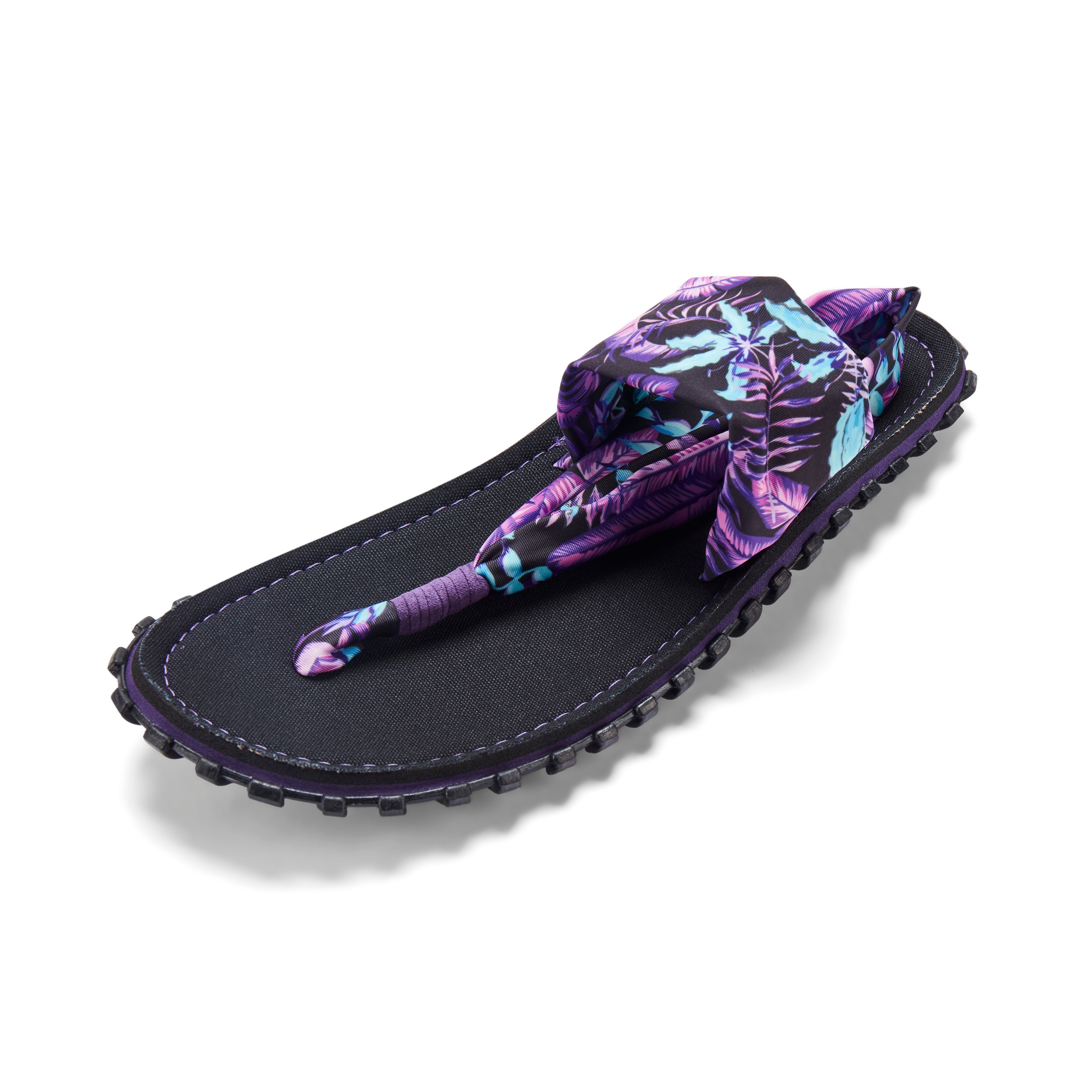 Purple floral sandal on a white background