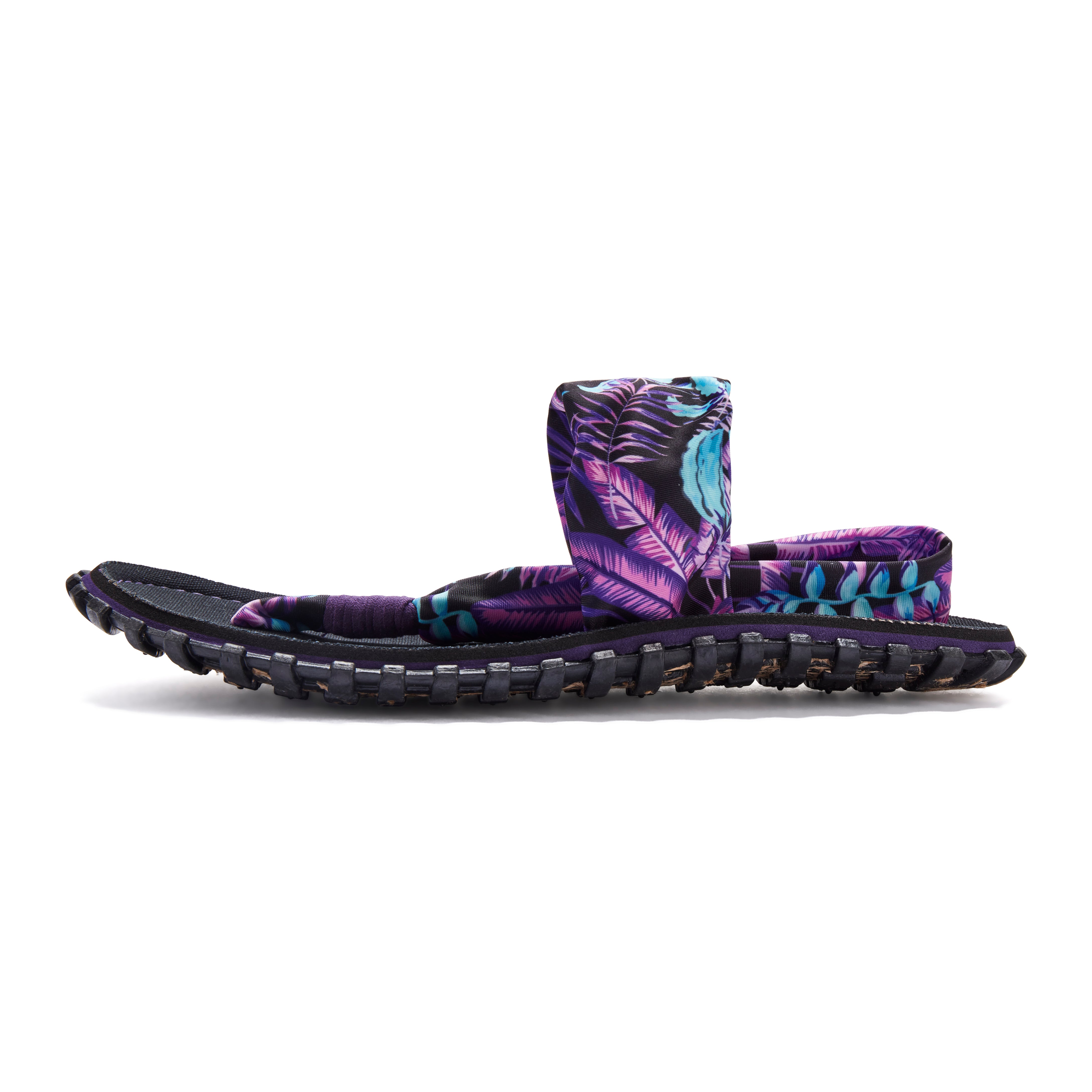 Purple and black sandal with leaf pattern on a white background