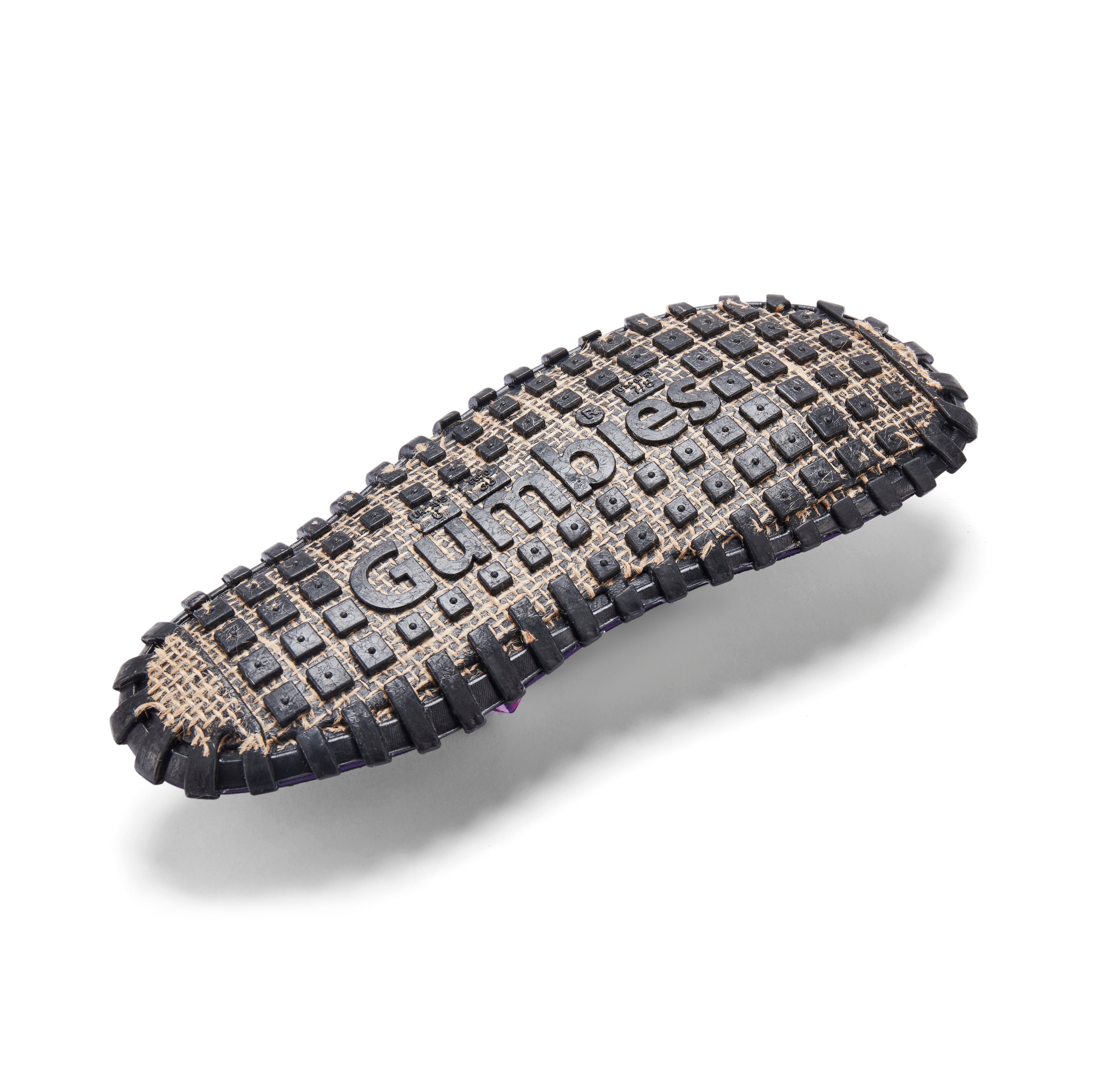 Bicycle tire with 'Gubler' branding on a white background