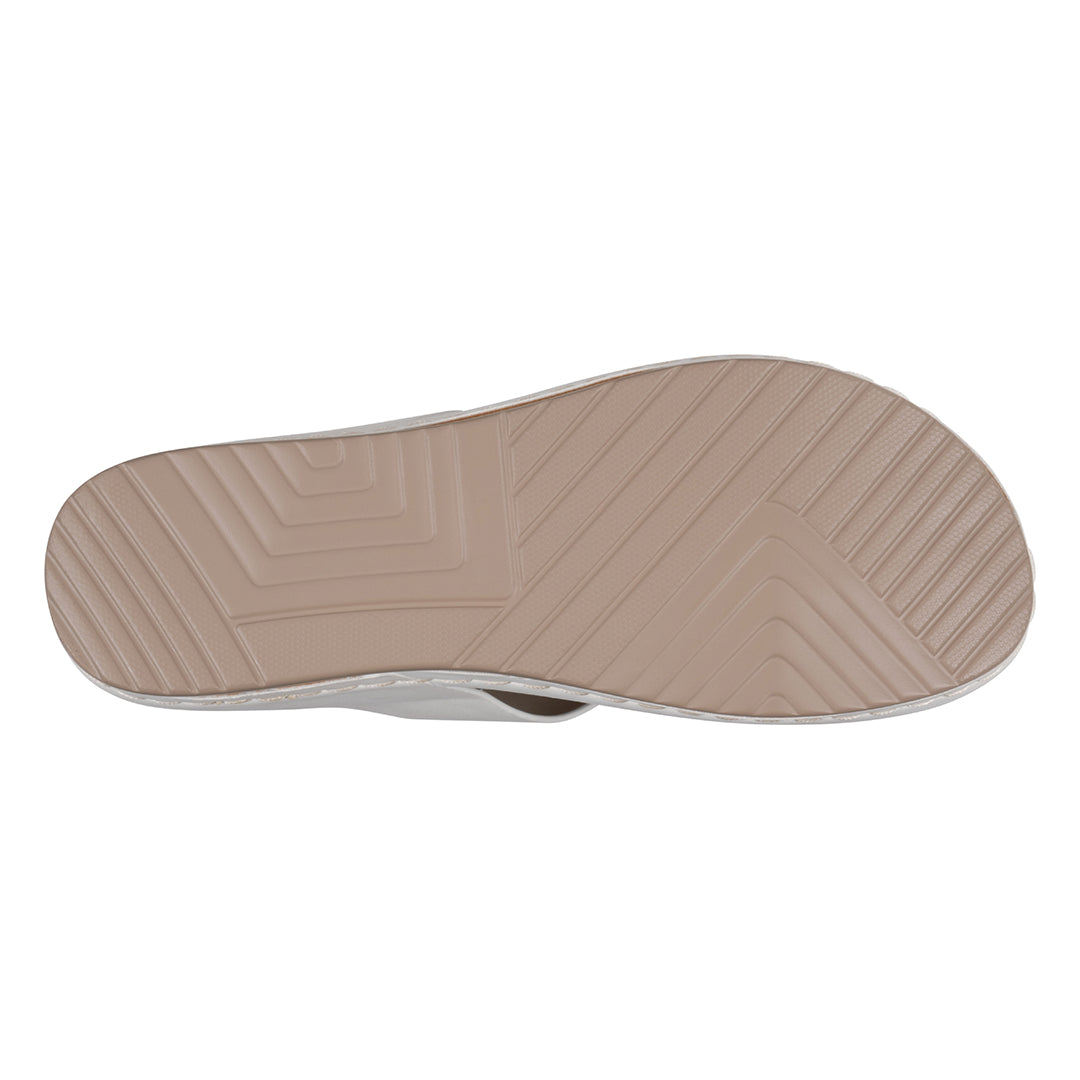 Tan shoe sole on a white background