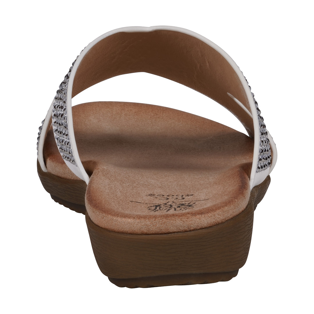 Brown sandal with white straps on a white background