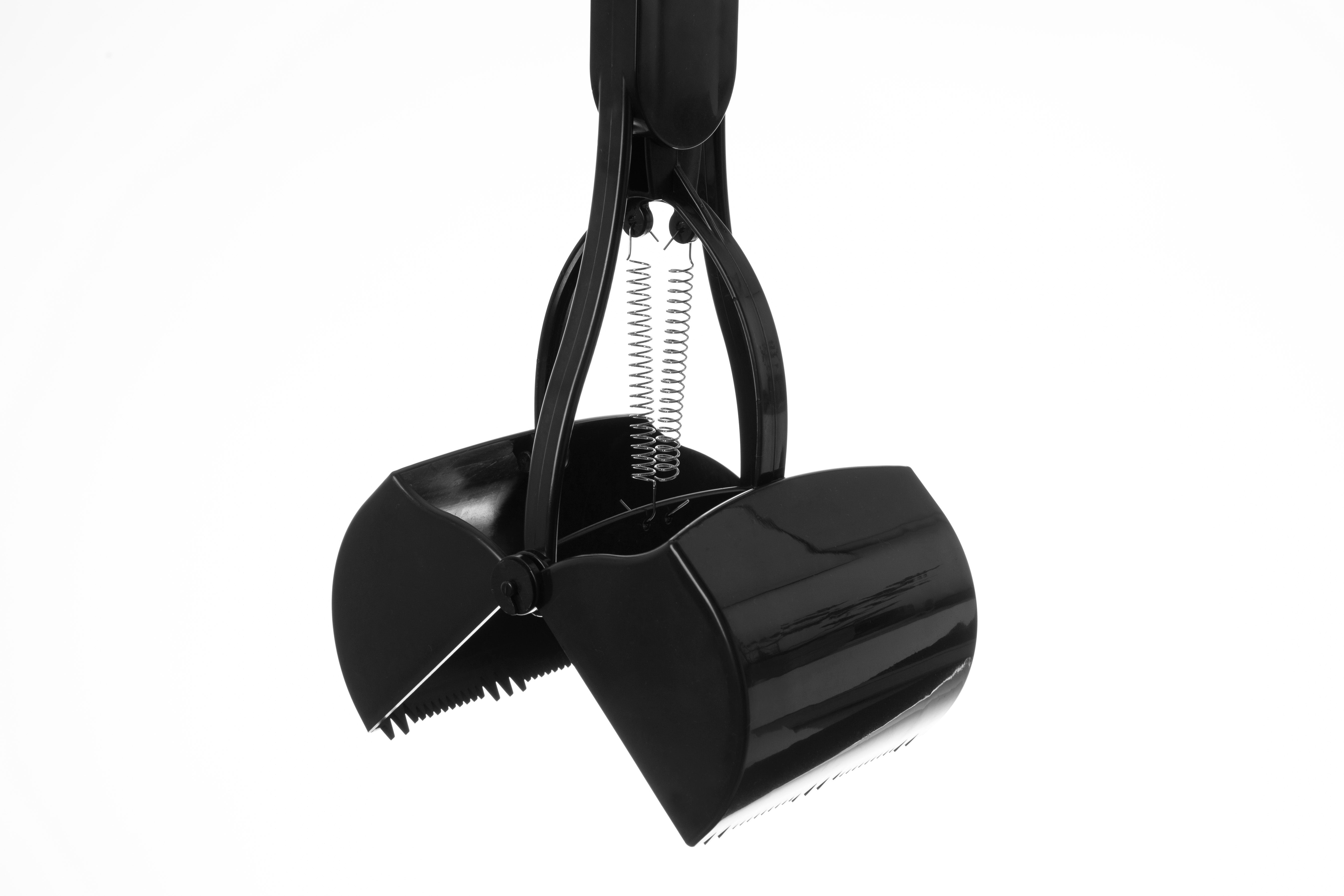 Black snow shovel on a white background
