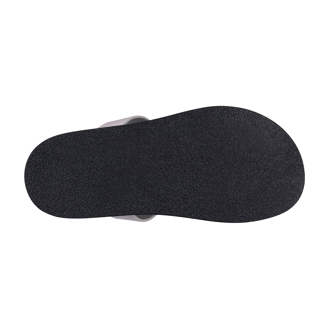 Black boot sole on a white background