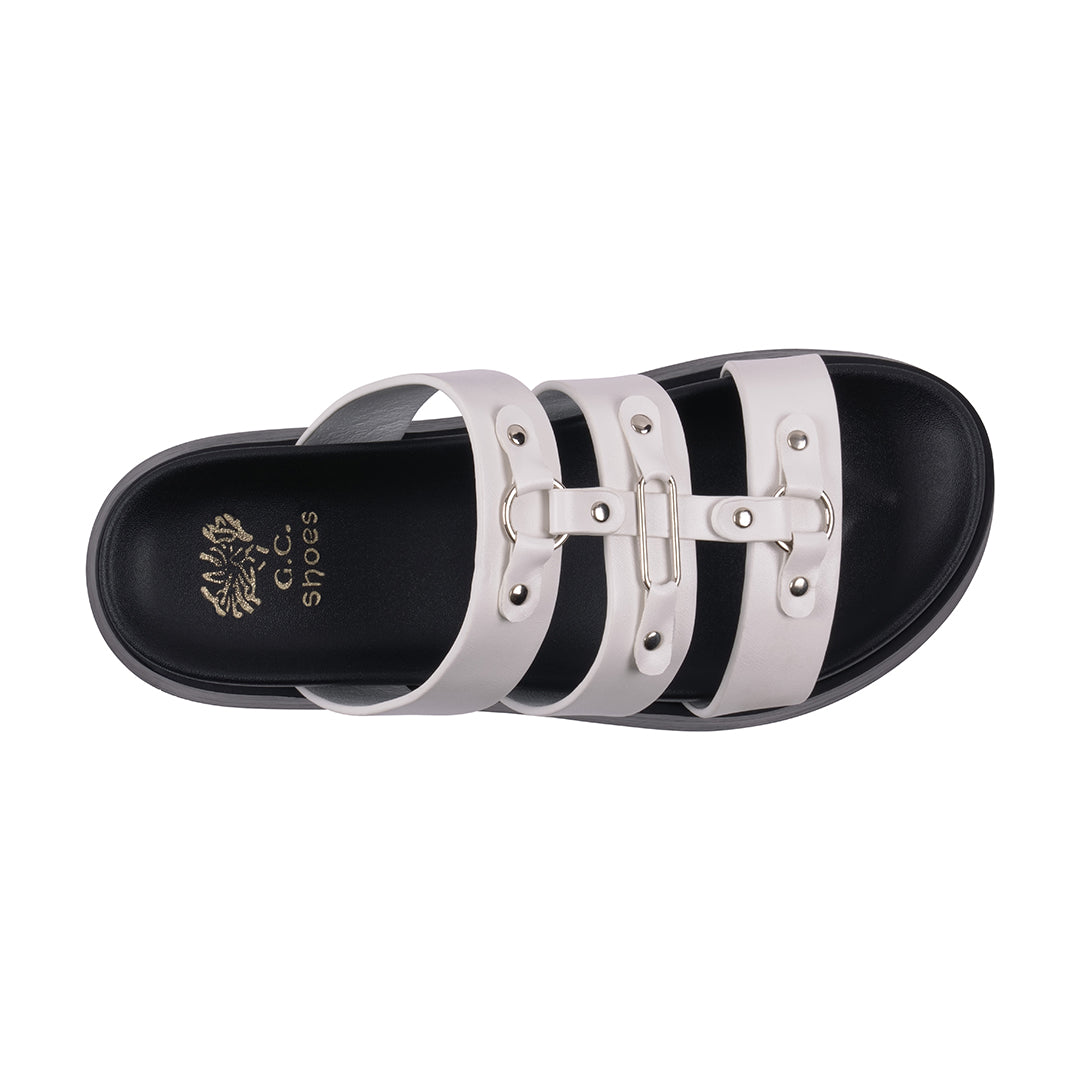 Black and white sandal with buckles on a white background
