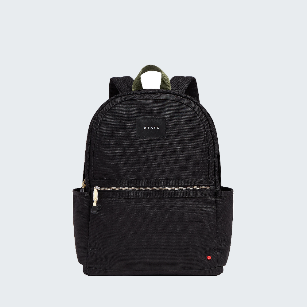 Black backpack with visible brand logo on a white background