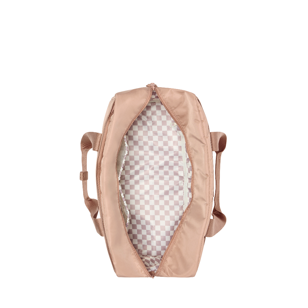 Pink backpack with checkered interior on a white background