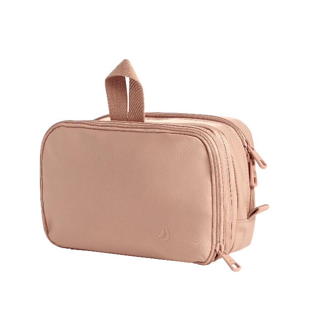 Beige toiletry bag on a white background