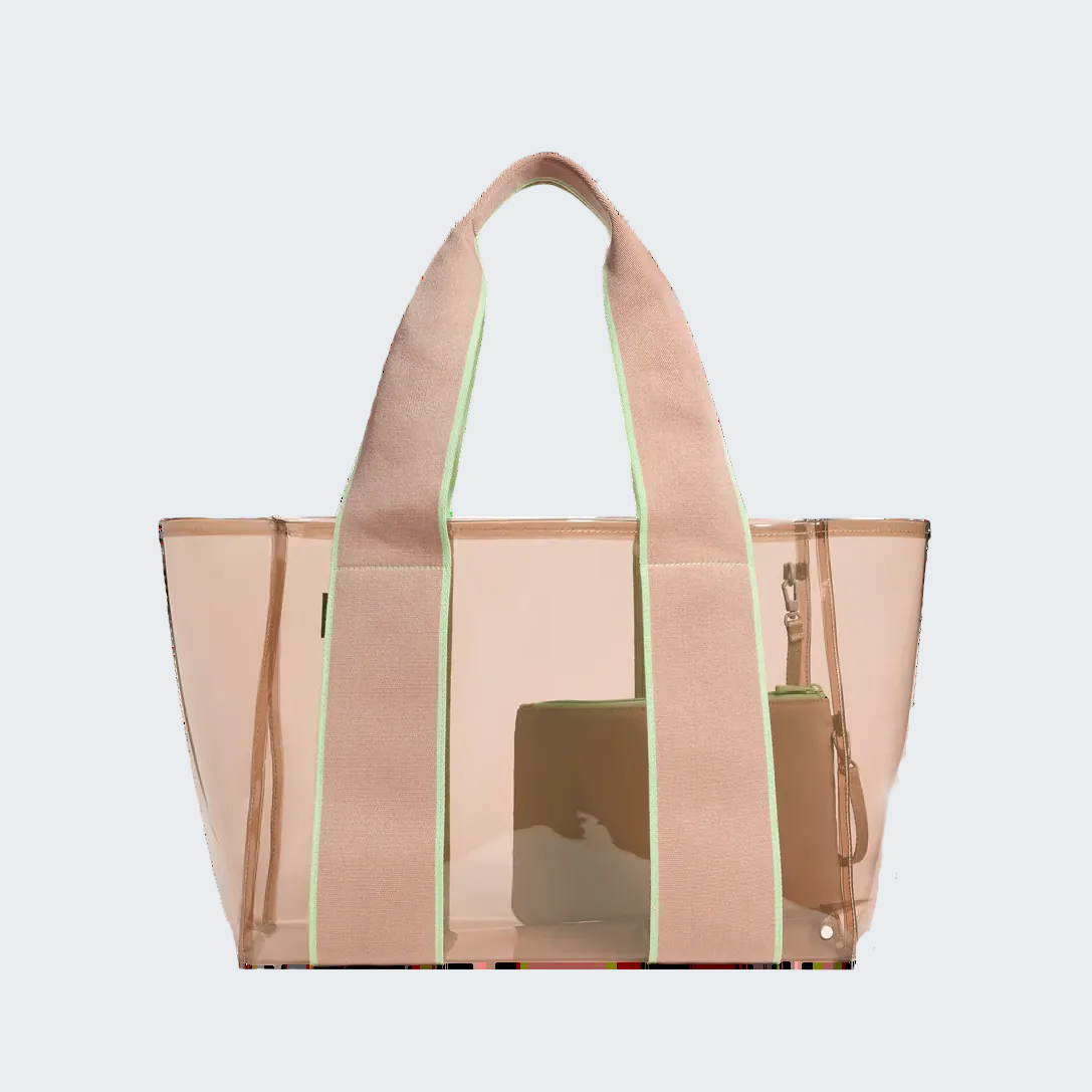 Translucent tote bag with beige handles and trim on a white background