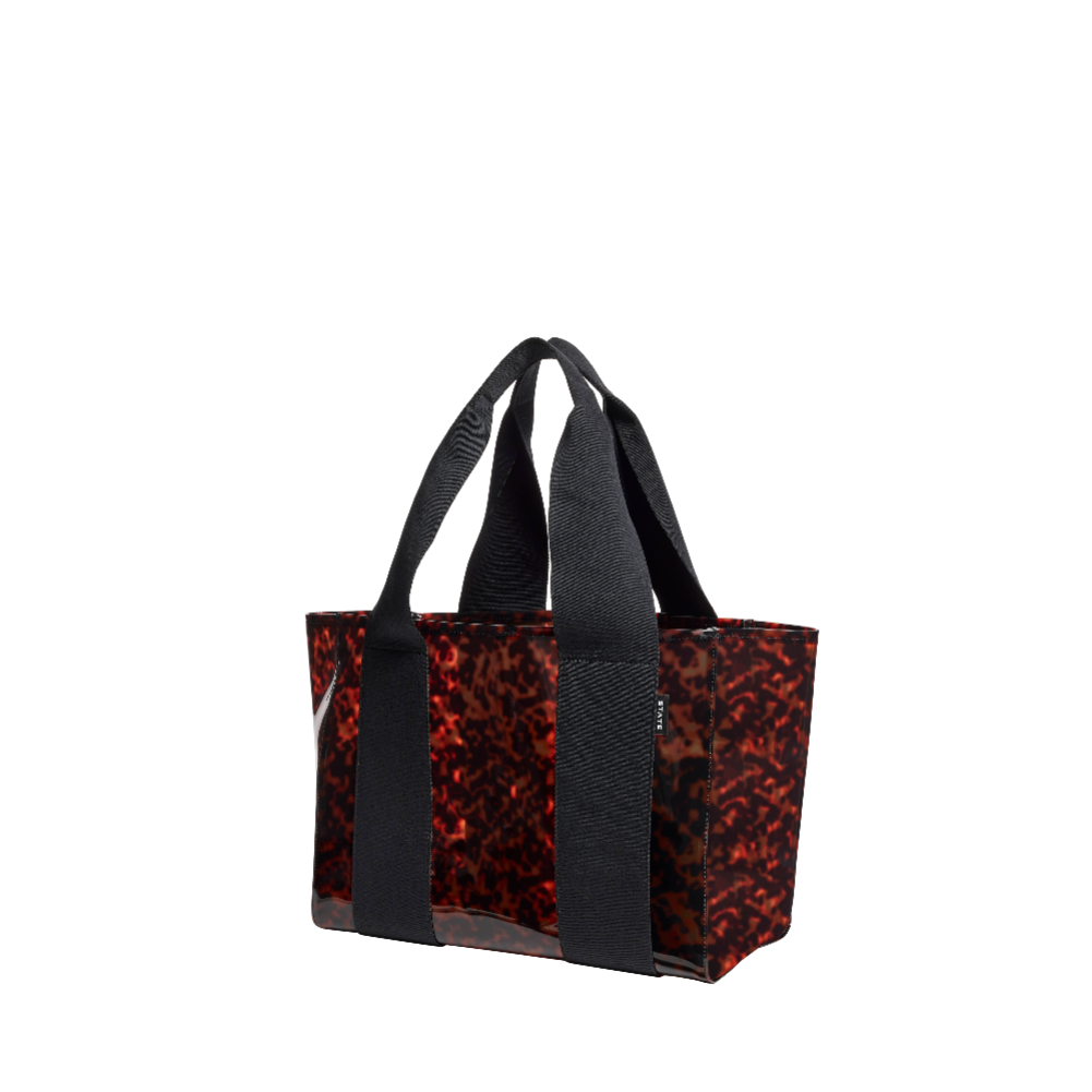 Tote bag with red leopard print pattern and black straps on a white background