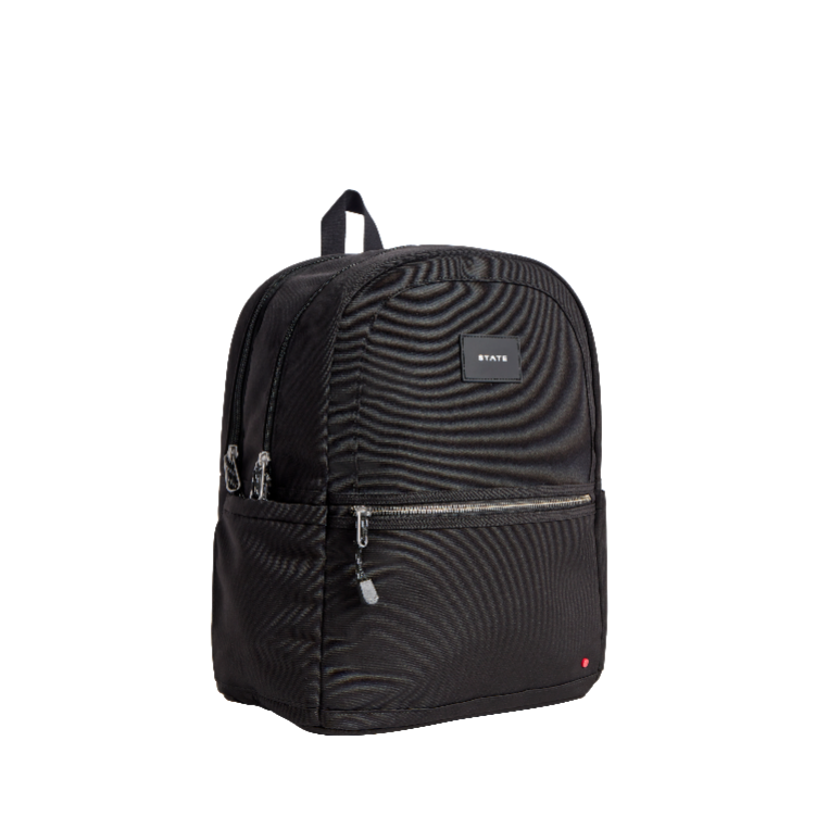 Black backpack with visible brand logo on a white background