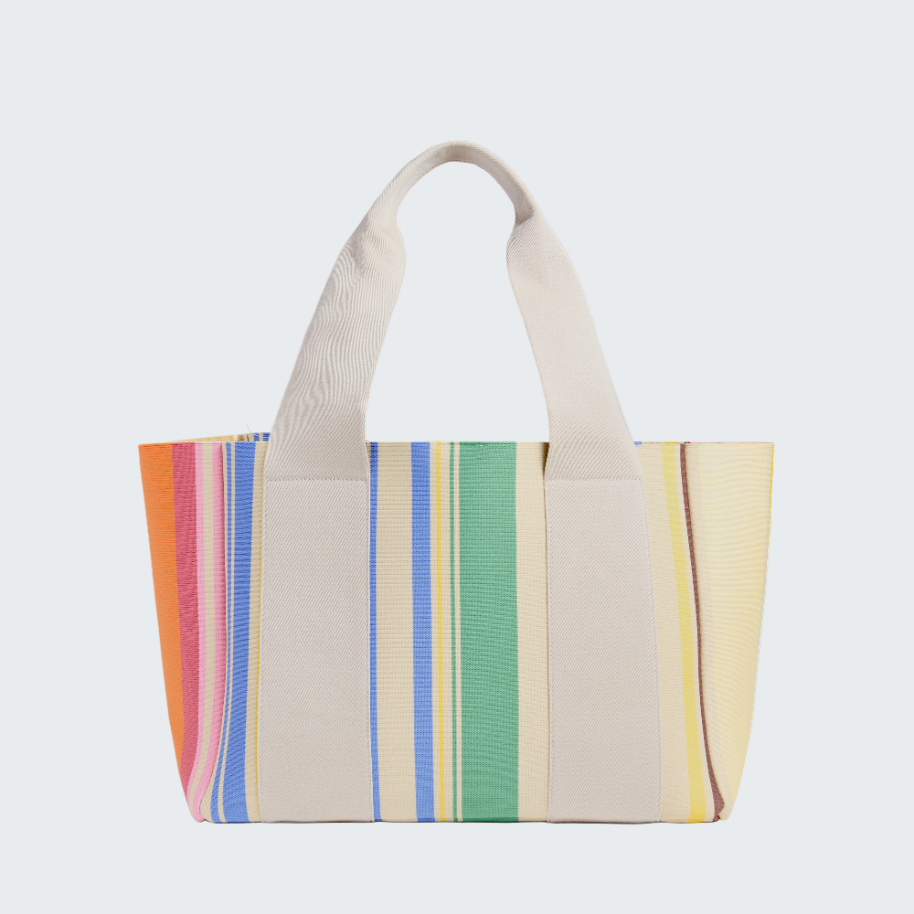 Tote bag with colorful striped pattern on a white background