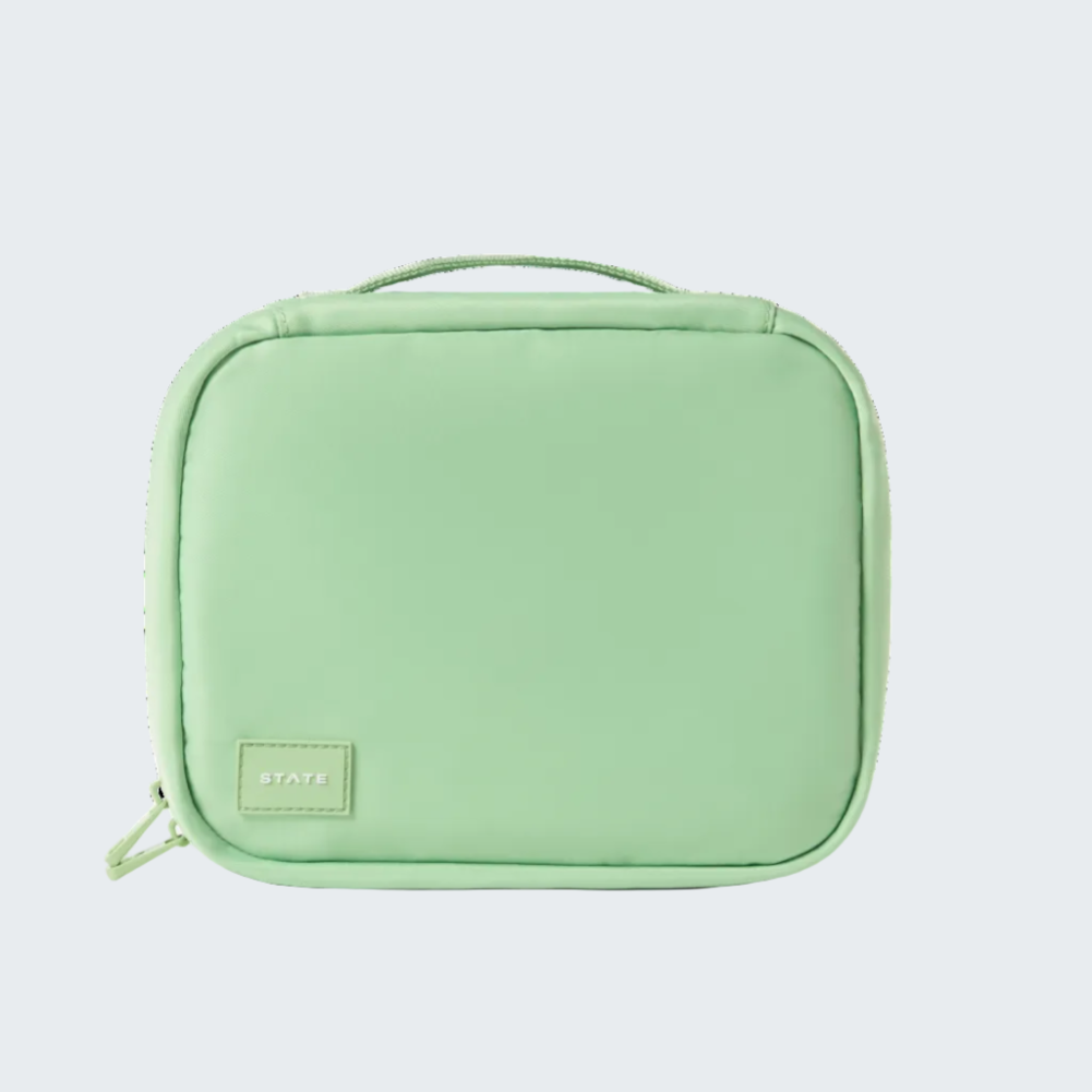 Light green travel pouch on a white background