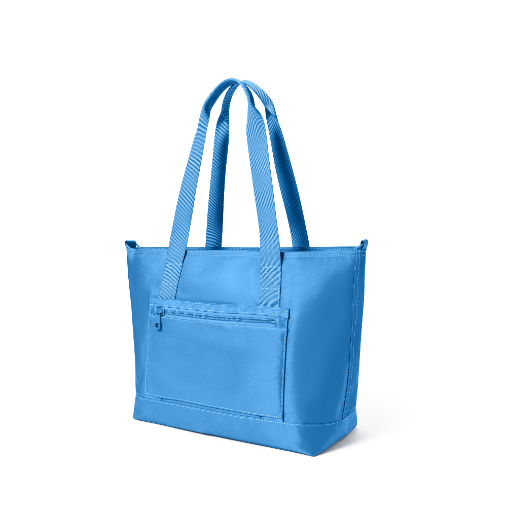 Blue tote bag with a pocket on a white background