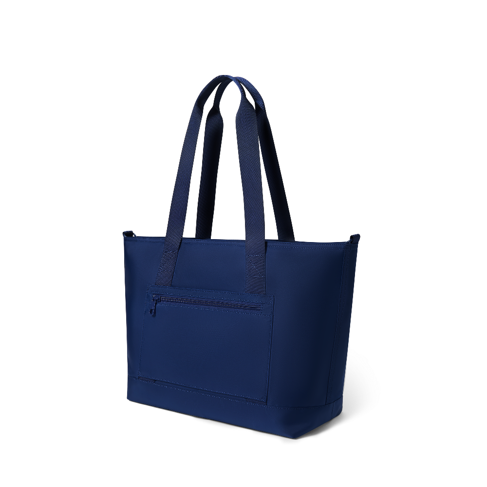 Navy blue tote bag with a front pocket on a white background