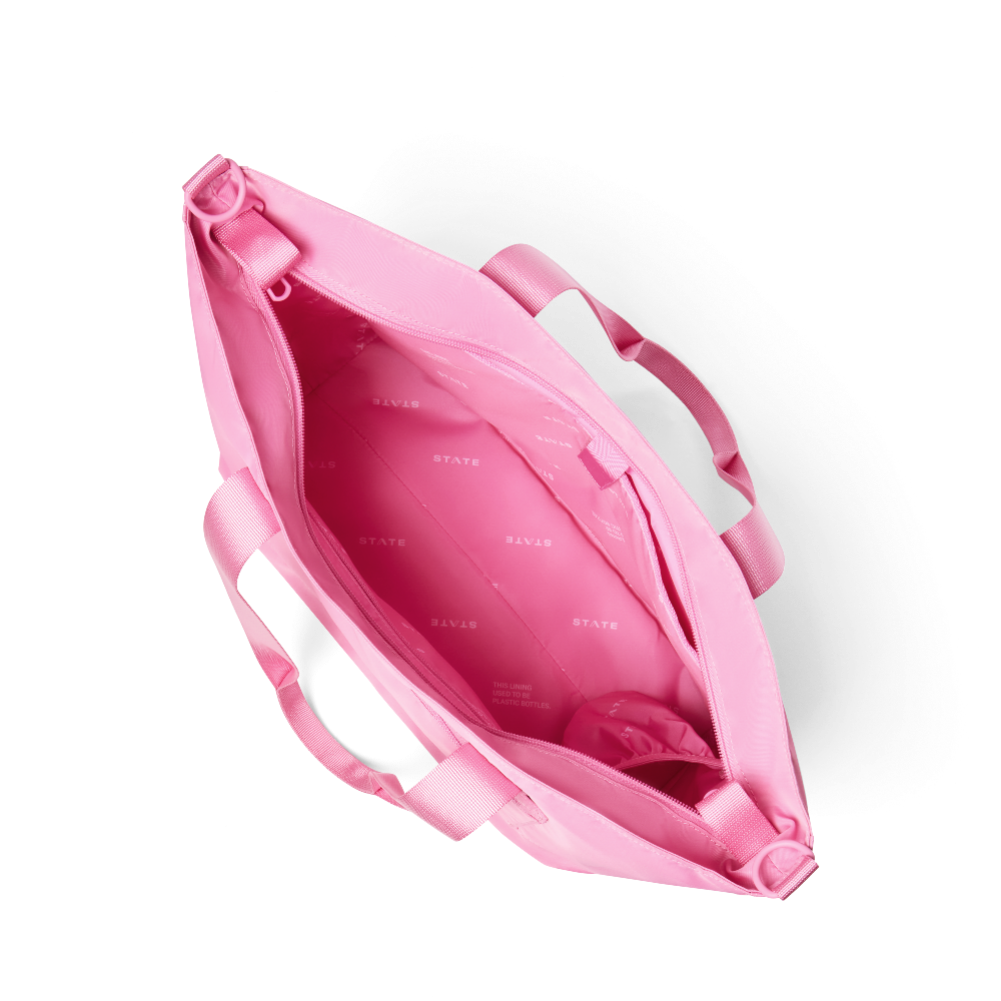 Pink plastic bag with measurement markings on a white background