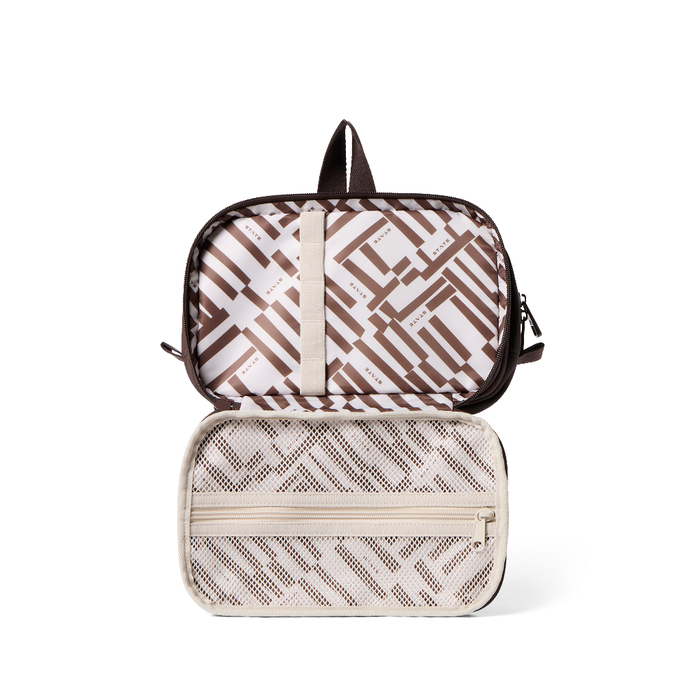 Two travel bags with geometric patterns on a white background