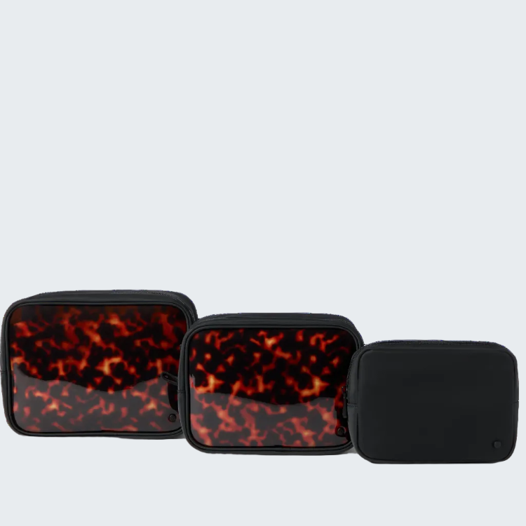 Three rectangular zippered pouches or cases arranged side by side on a white background. The two larger cases on the left have a glossy tortoiseshell-style pattern in dark red, orange, and black, while the smaller case on the right is solid black.
