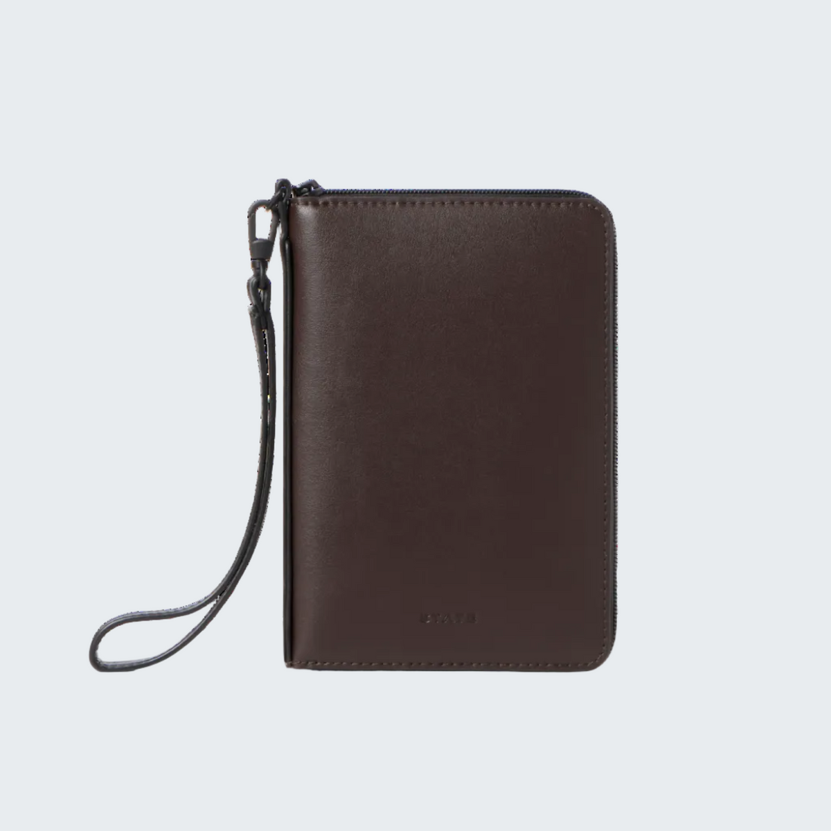 A dark brown leather zip-around wallet with a wristlet strap, shown on a plain white background.