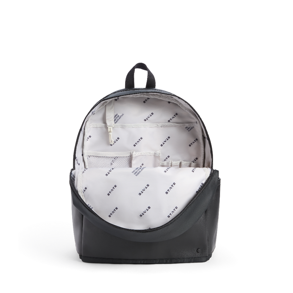 Black backpack with white interior and visible brand logo on a white background