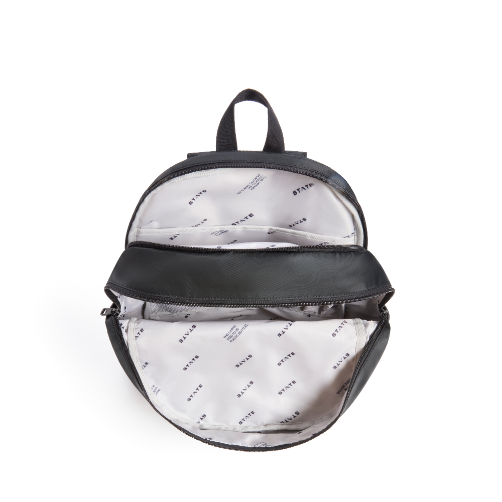 Black backpack with white interior lining on a white background
