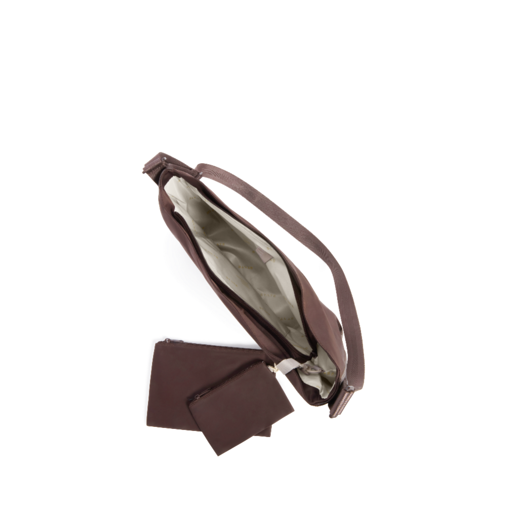 Brown leather bag with a pouch on a white background