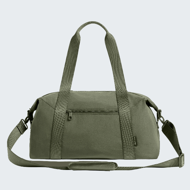 An olive green duffel bag with dual top handles, a front zippered pocket, and an adjustable shoulder strap, shown against a plain white background.
