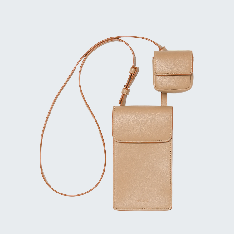 A light tan leather crossbody phone pouch set with a main flap pouch, a smaller attached pouch, and a matching adjustable shoulder strap, shown on a plain white background.