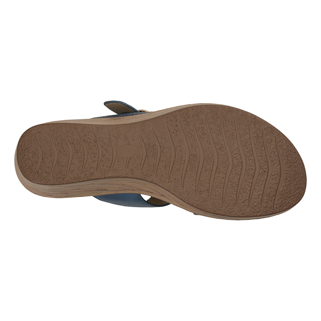 Brown sole of a shoe on a white background