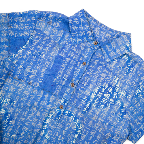 Blue shirt with white text pattern on a white background