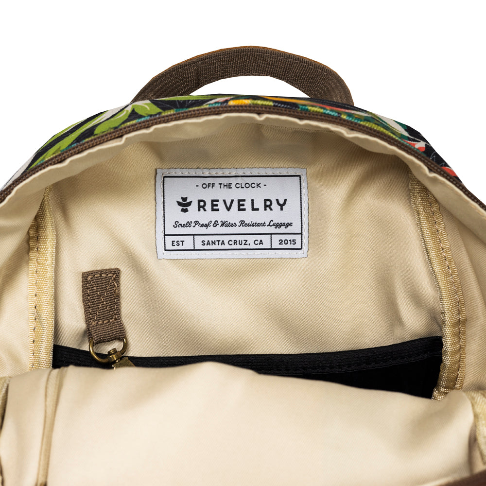 Backpack interior with a Revelry label on a white background