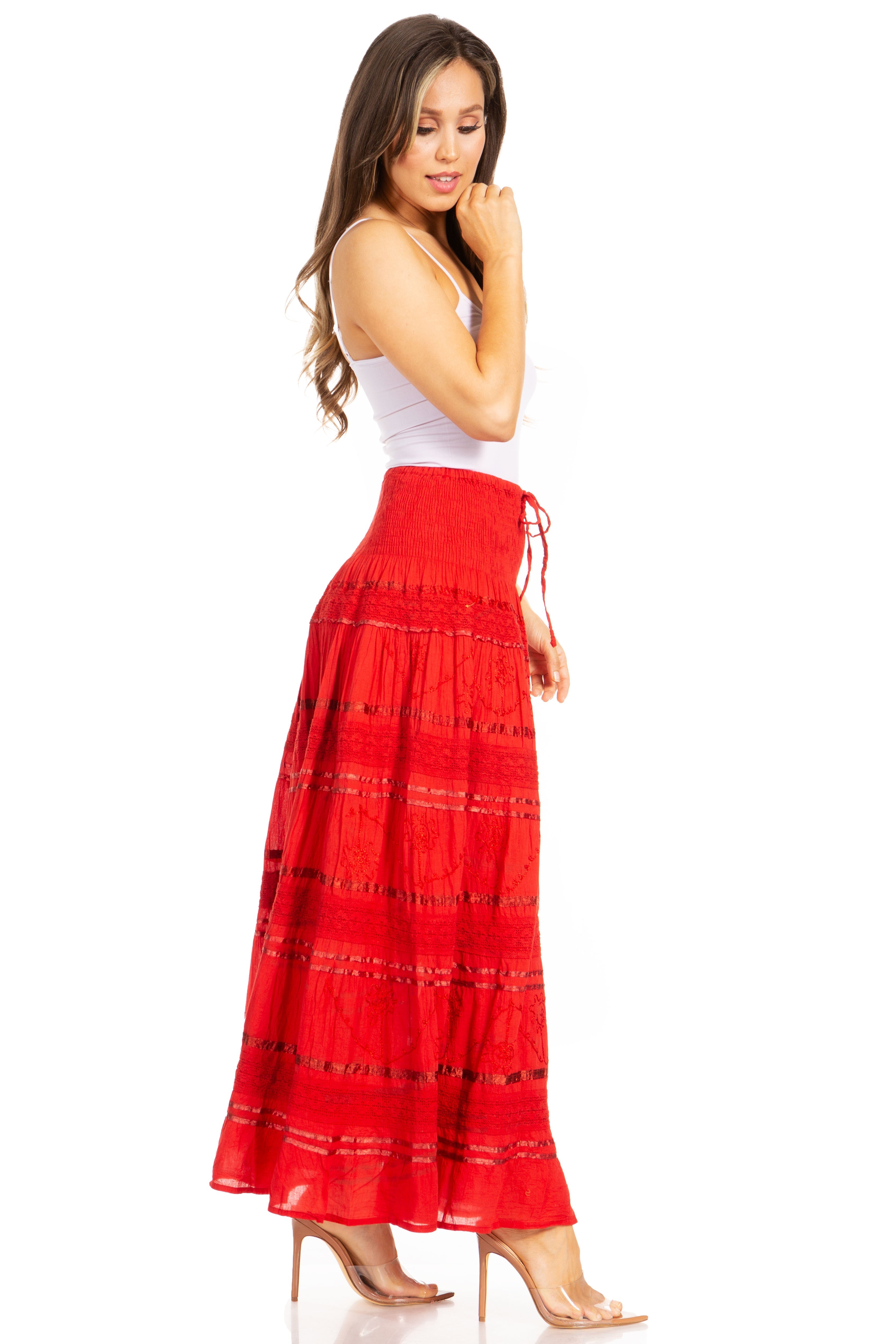 Woman wearing a red skirt with a white background