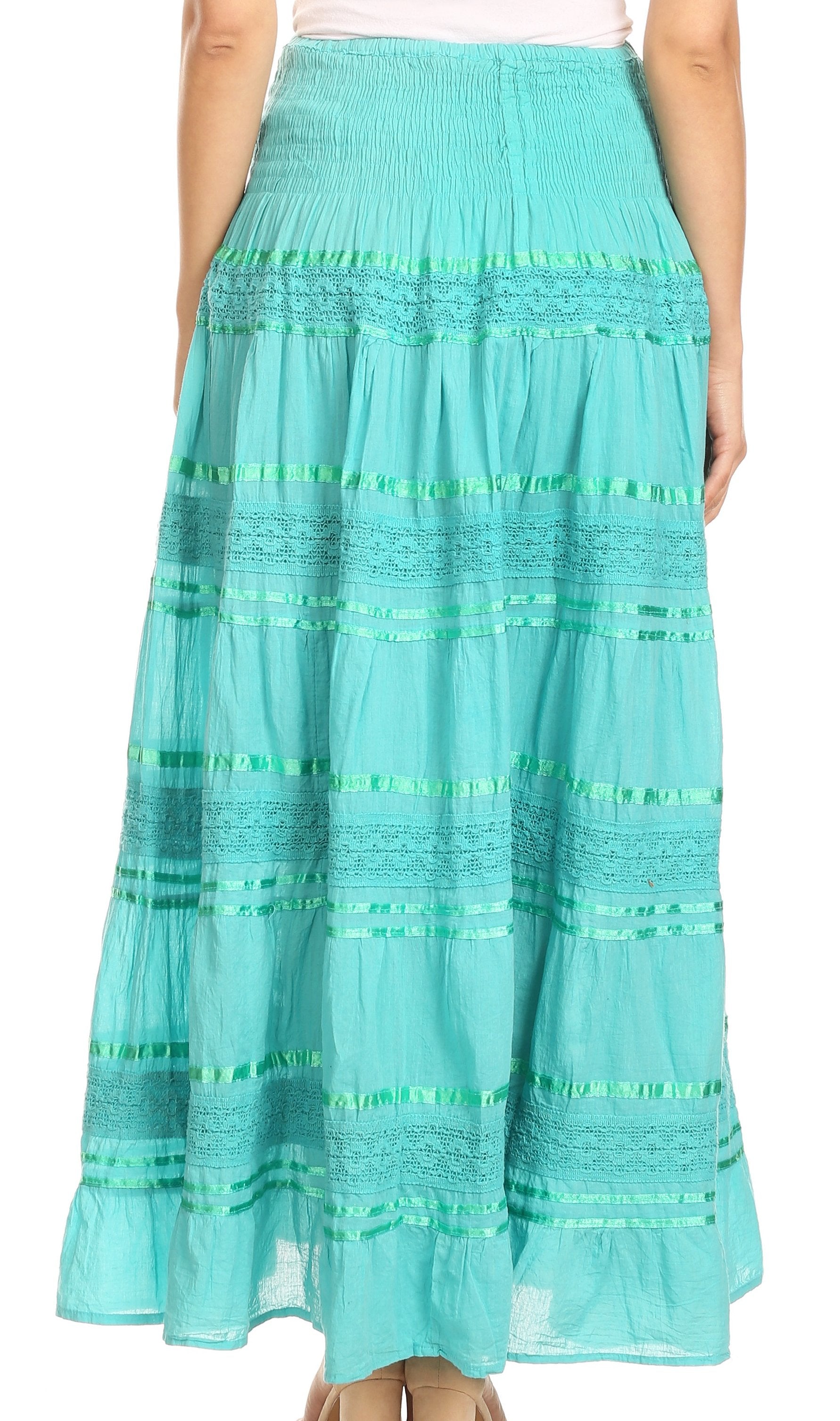 Turquoise skirt with green accents on a white background