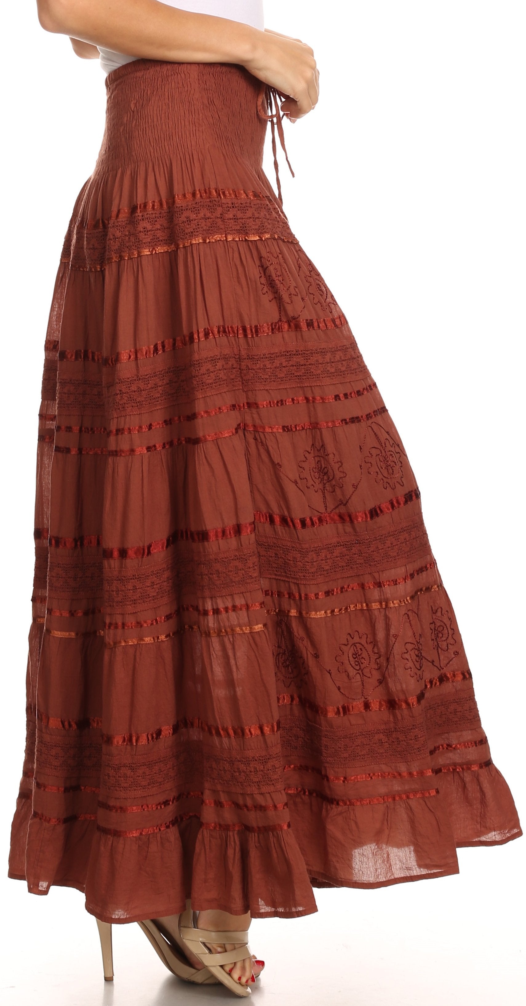 Brown embroidered maxi skirt on a white background