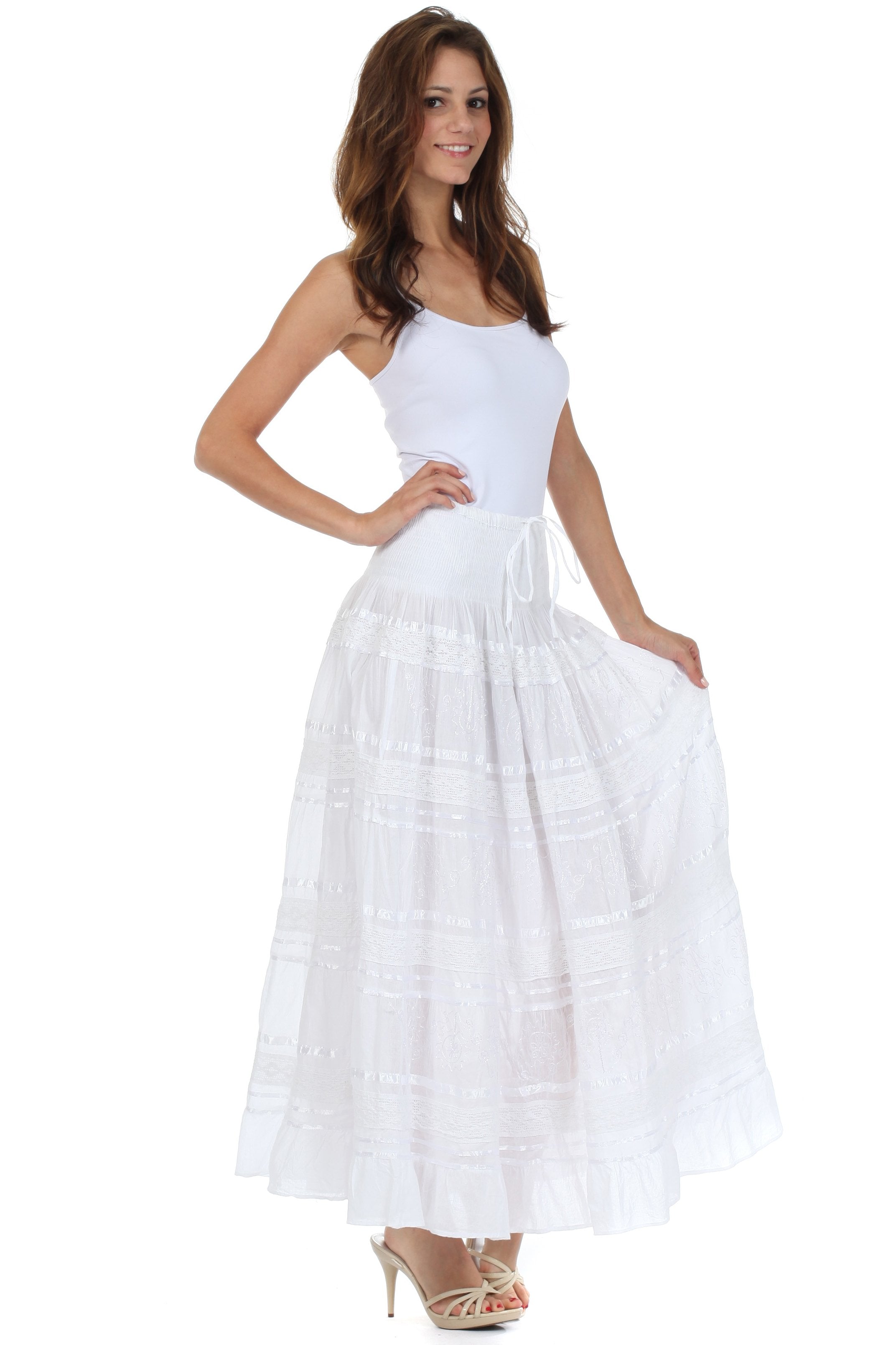 Woman wearing a white dress on a white background