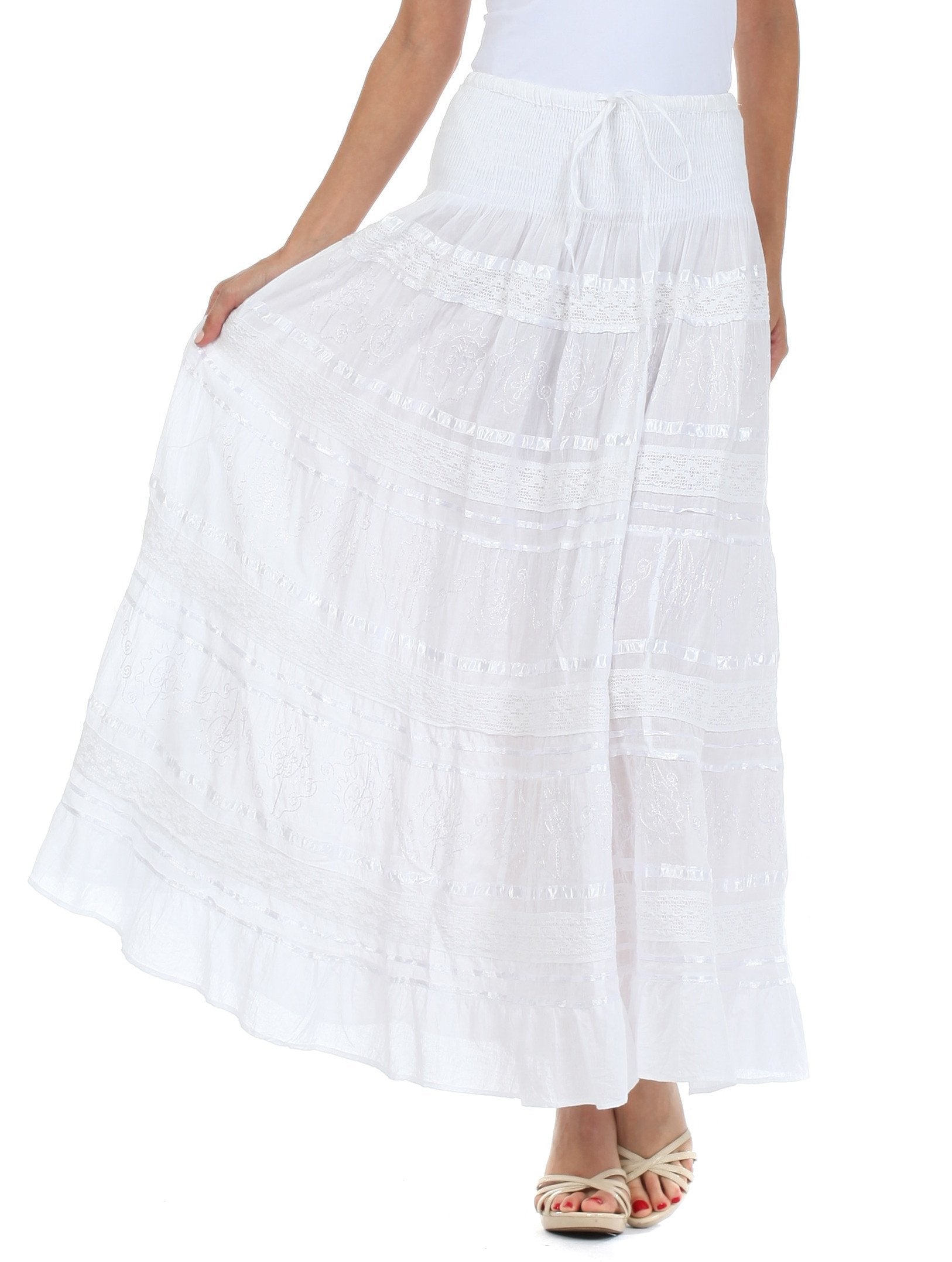 White skirt worn by a person on a white background