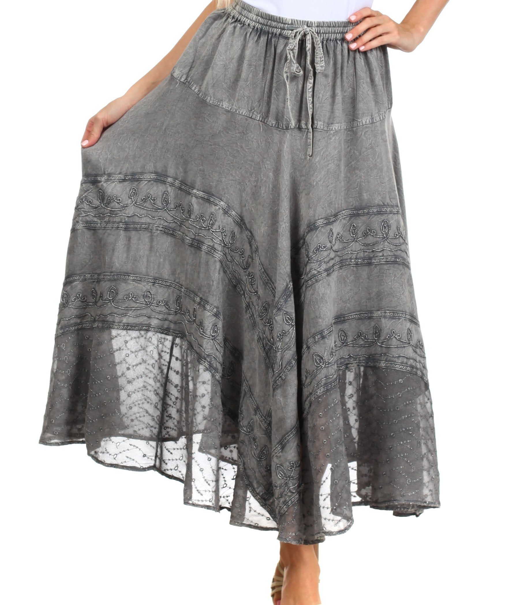 Gray lace skirt worn by a person on a white background