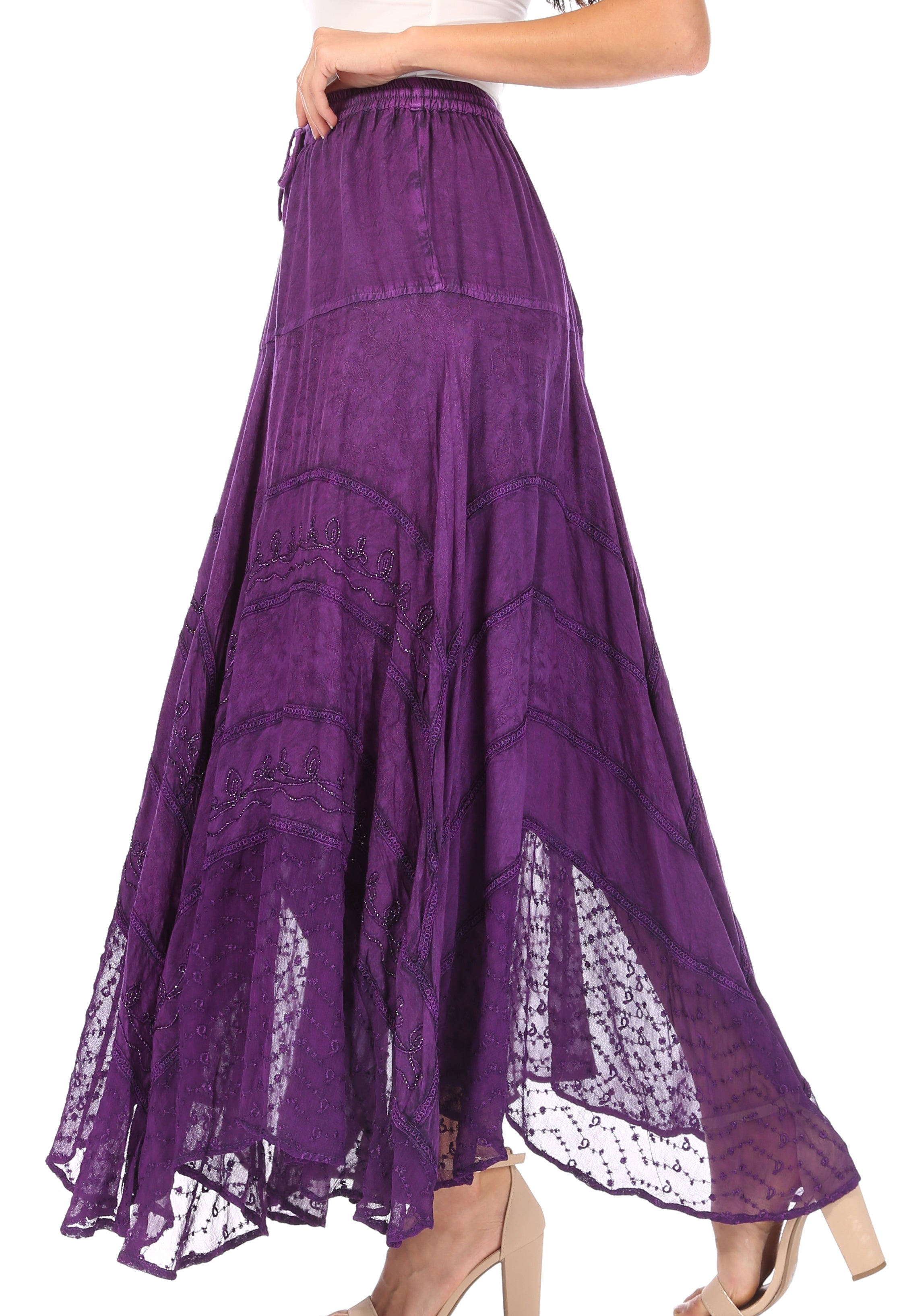 Purple lace skirt with white lace trim on a white background