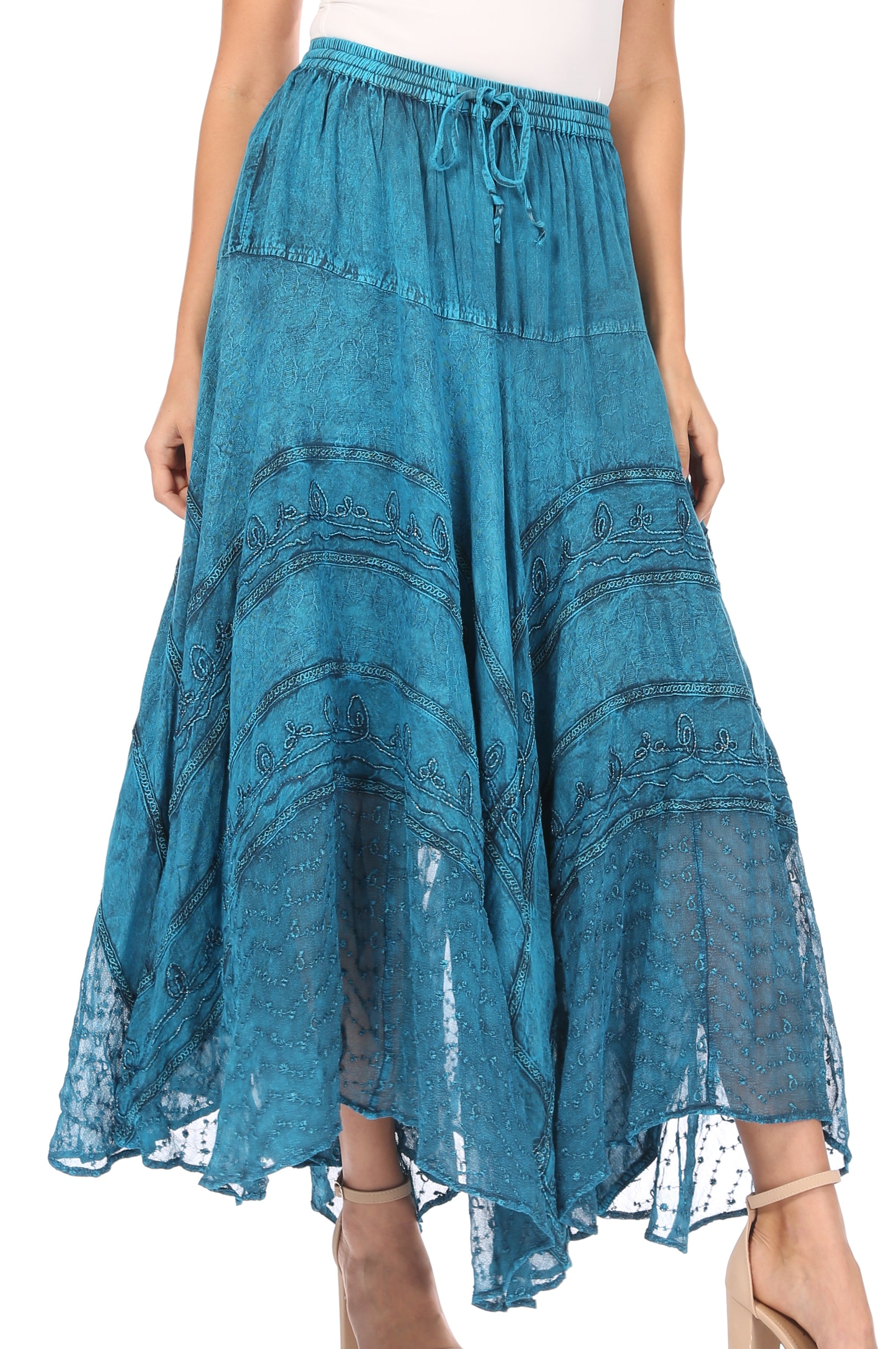 Teal lace skirt worn by a person on a white background