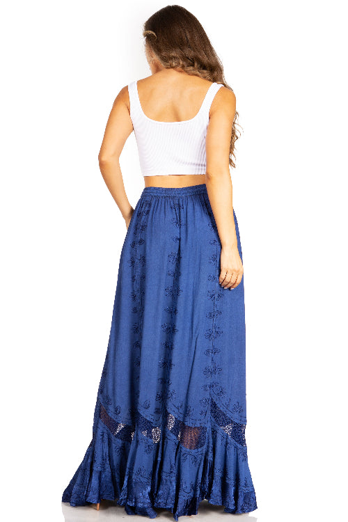 Woman wearing a blue skirt and white top on a white background