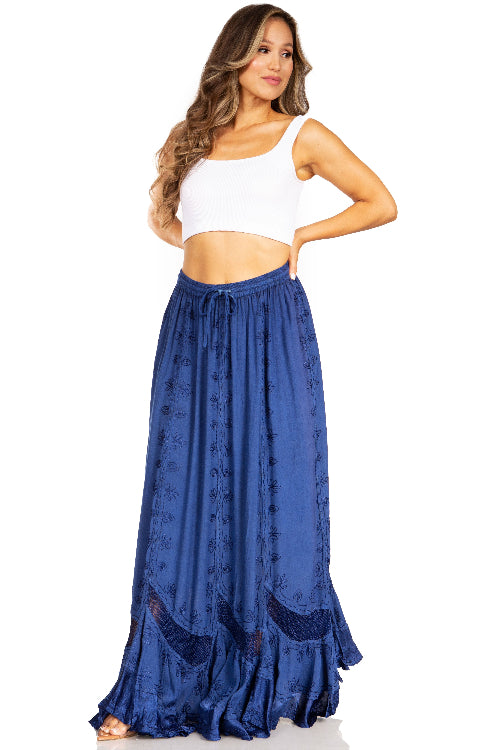 Woman wearing a white top and blue skirt on a white background