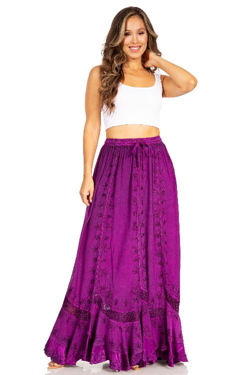 Woman wearing a purple skirt with a white top on a white background