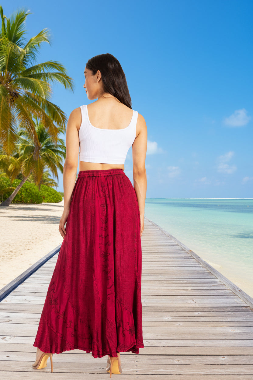 Woman wearing a white top and red skirt on a white background