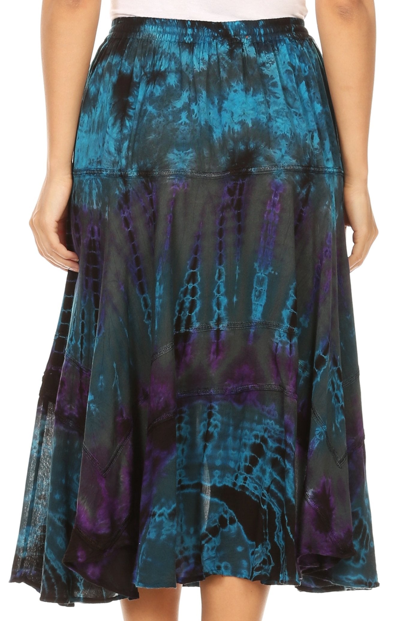 Tie-dye skirt with blue and purple patterns on a plain background