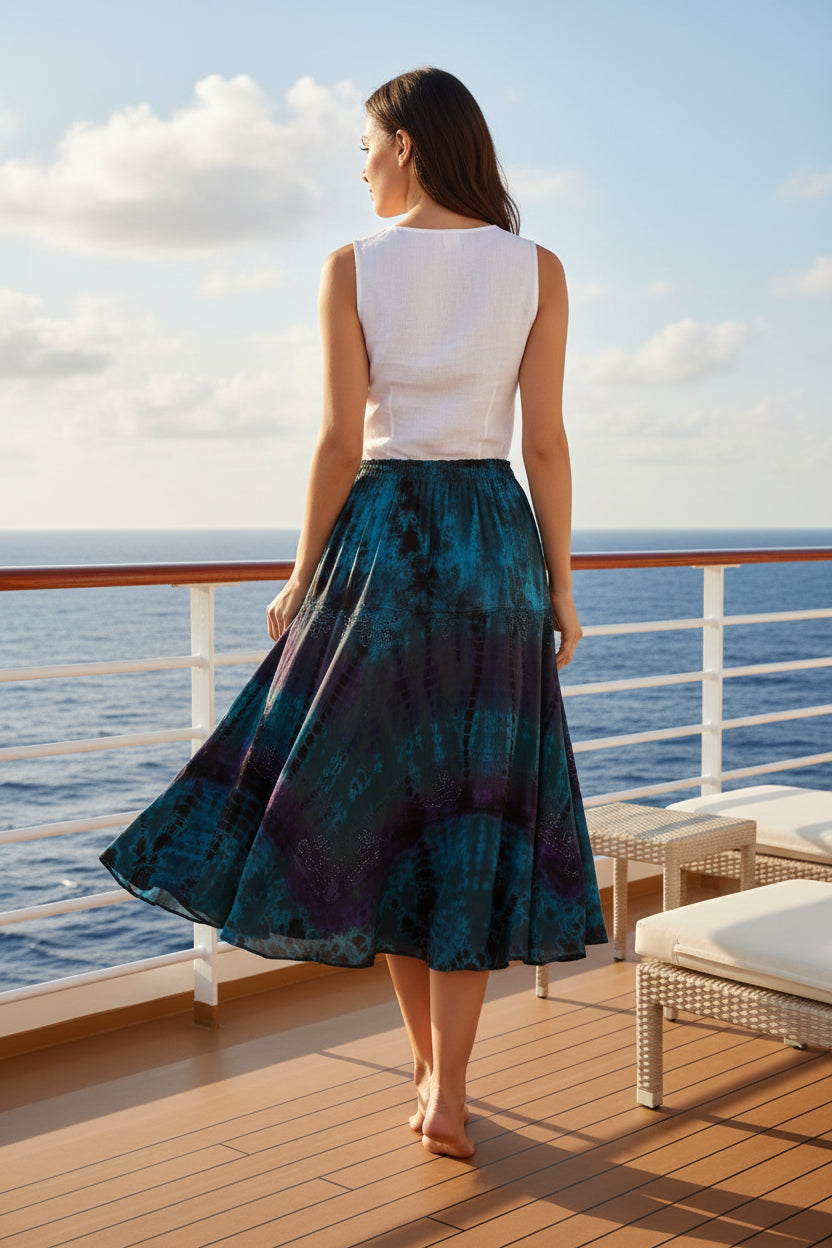 Long, patterned skirt with a mix of blue, purple, and black on a white background