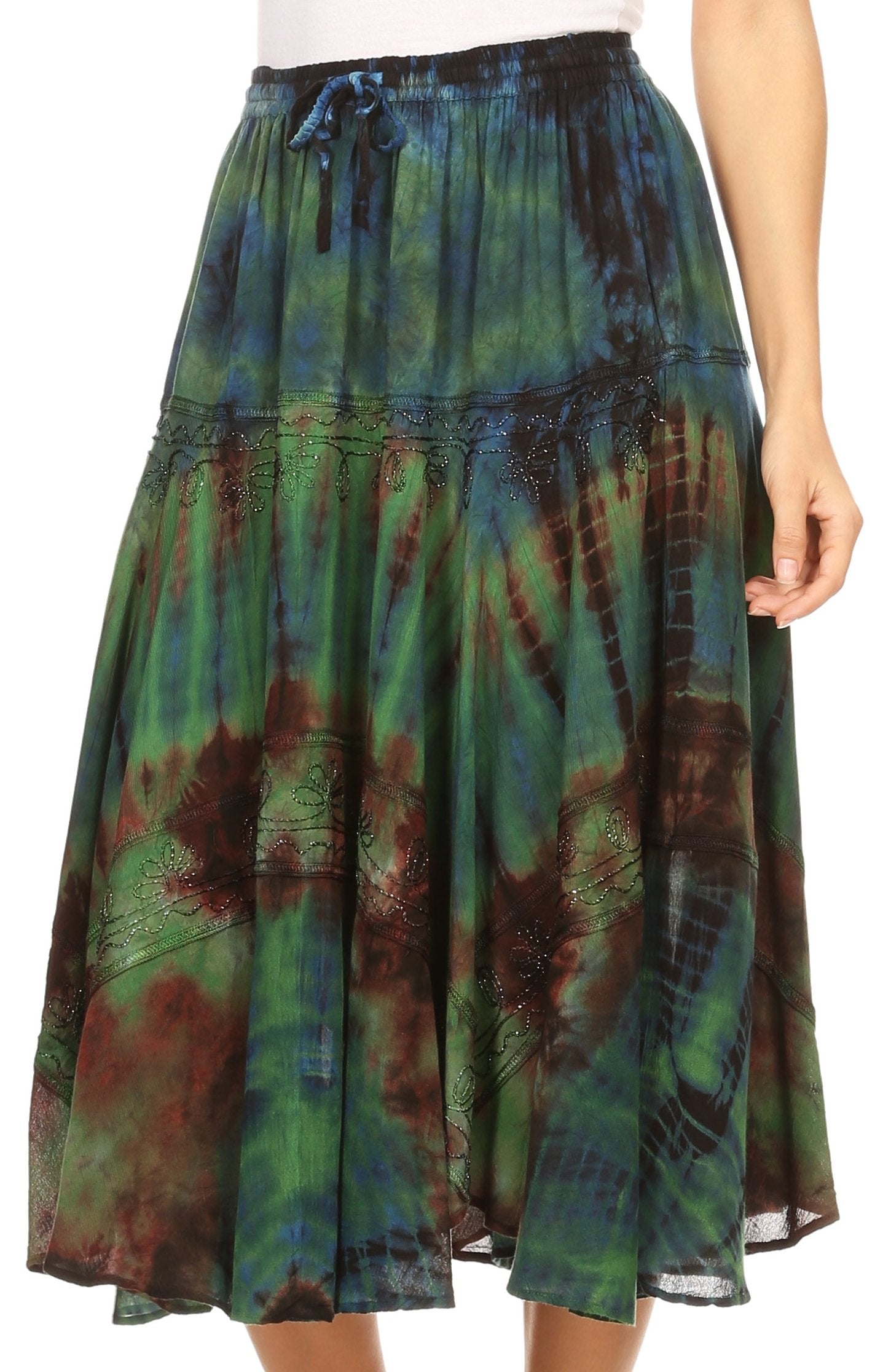 Tie-dye skirt with green, blue, and brown patterns on a white background