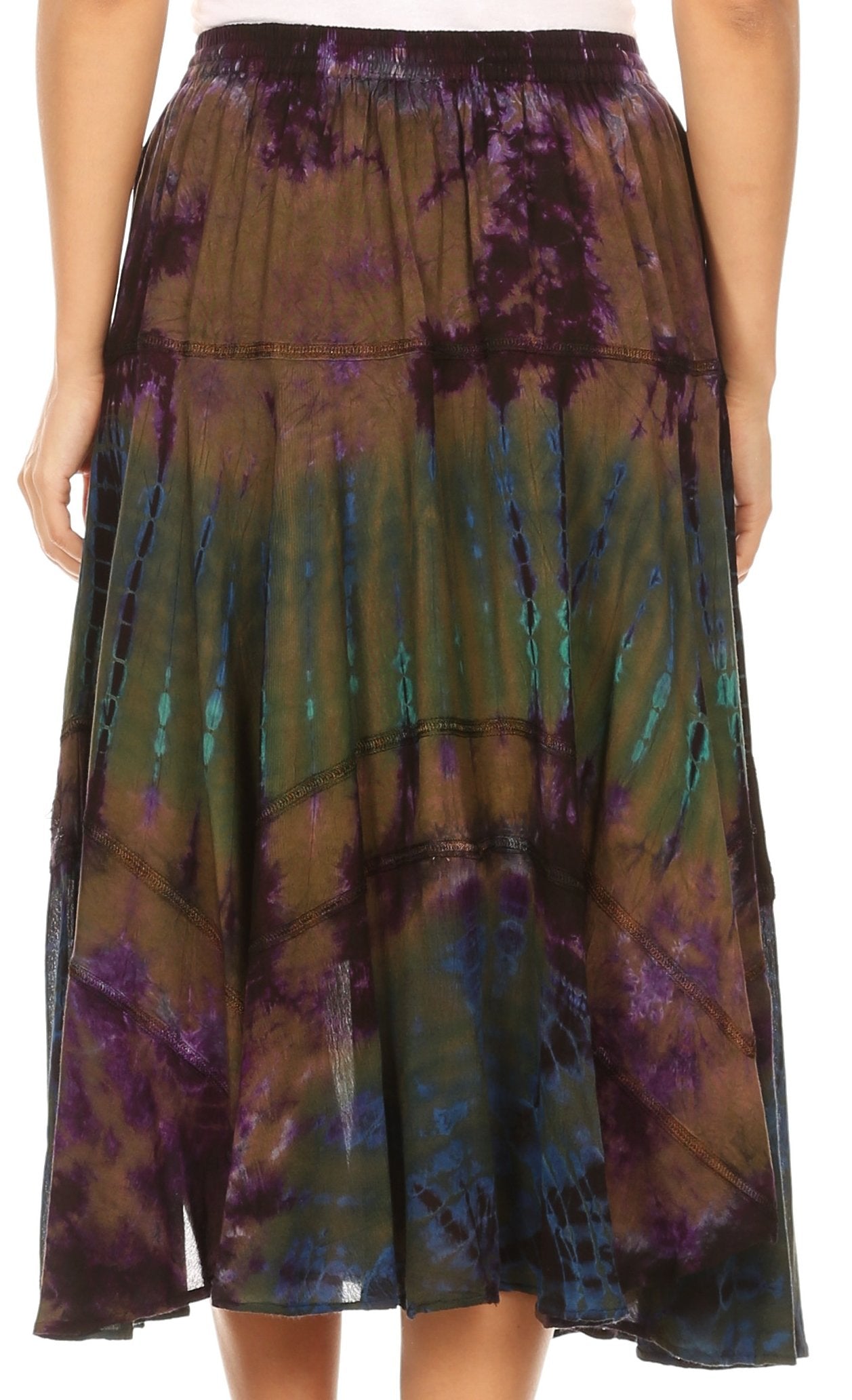 Tie-dye skirt with purple and green patterns on a person